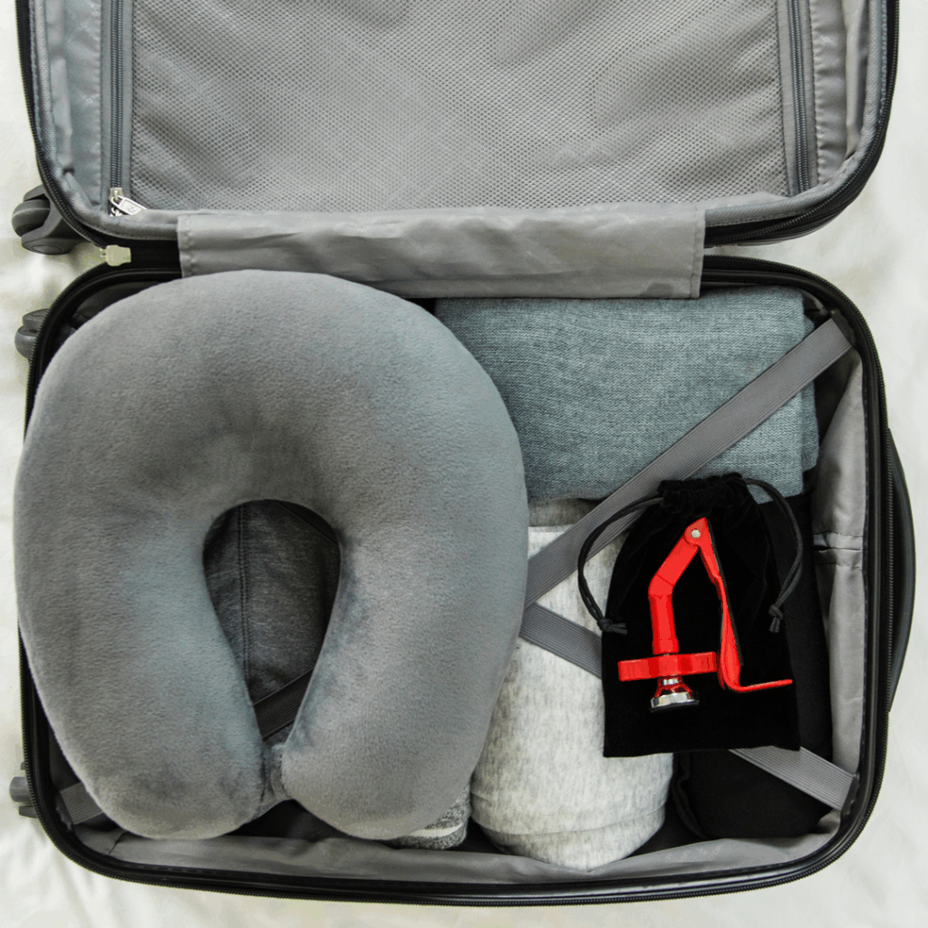 DoorJammer portable door lock device packed in suitcase
